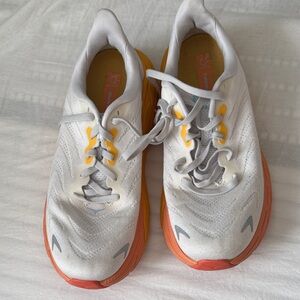 Hoka White and Orange Athletic Shoes